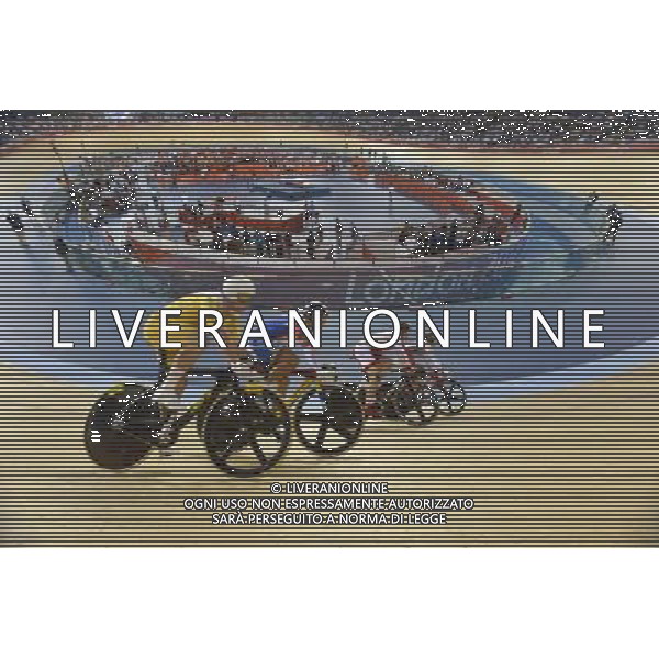 Cyclists in the 1st round of the men\'s Keirin.. Velodrome, Olympic Park, Stratford. London AG ALDO LIVERANI S A S ONLY ITALY