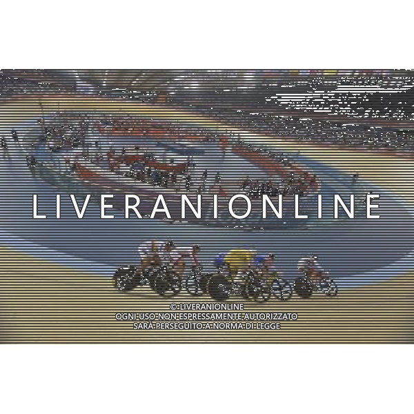 Cyclists in the 1st round of the men\'s Keirin.. Velodrome, Olympic Park, Stratford. London AG ALDO LIVERANI S A S ONLY ITALY