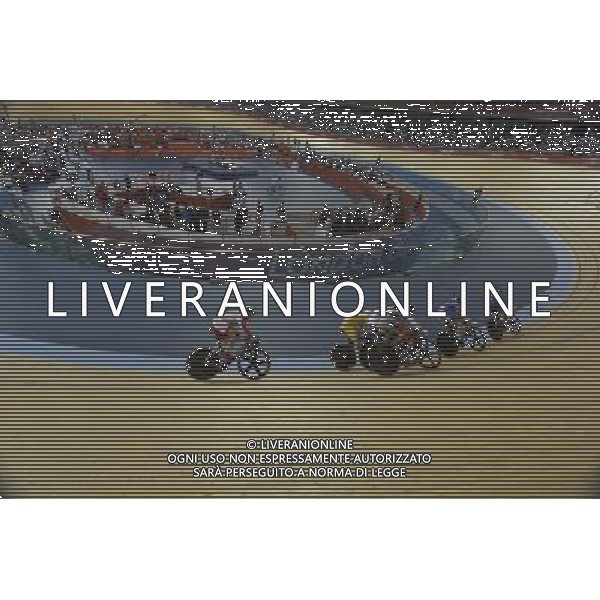 Cyclists in the 1st round of the men\'s Keirin.. Velodrome, Olympic Park, Stratford. London AG ALDO LIVERANI S A S ONLY ITALY