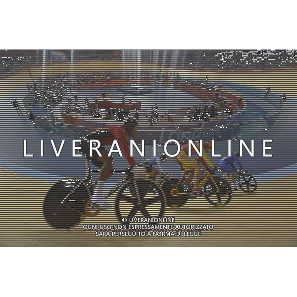 Cyclists in the 1st round of the men\'s Keirin.. Velodrome, Olympic Park, Stratford. London AG ALDO LIVERANI S A S ONLY ITALY