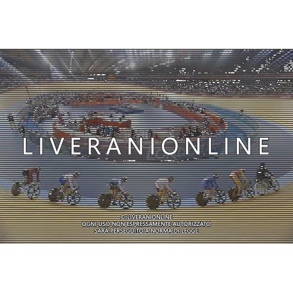 Cyclists in the 1st round of the men\'s Keirin.. Velodrome, Olympic Park, Stratford. London AG ALDO LIVERANI S A S ONLY ITALY