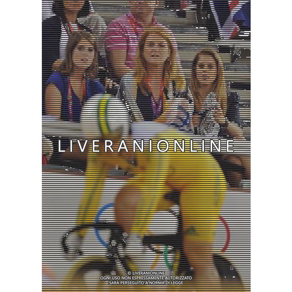 (left to right) Princess Eugenie, Sarah, Duchess of York and Princess Beatrice , watch the action in the Olympic Velodrome in Stratford east London. Tuesday August 7, 2012. AG ALDO LIVERANI S A S ONLY ITALY