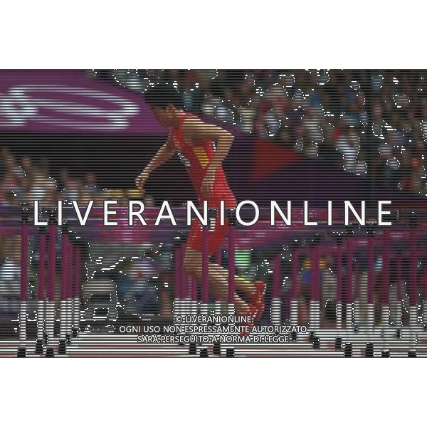 (120807) -- LONDON, Aug. 7, 2012 () -- China\'s Liu Xiang hops off the track after men\'s 110m hurdles heat at London 2012 Olympic Games, London, Britain, Aug. 7, 2012. Liu Xiang tumbled and was disqualified for semifinal.(/Liao Yujie)(zgp) AG ALDO LIVERANI S A S ONLY ITALY
