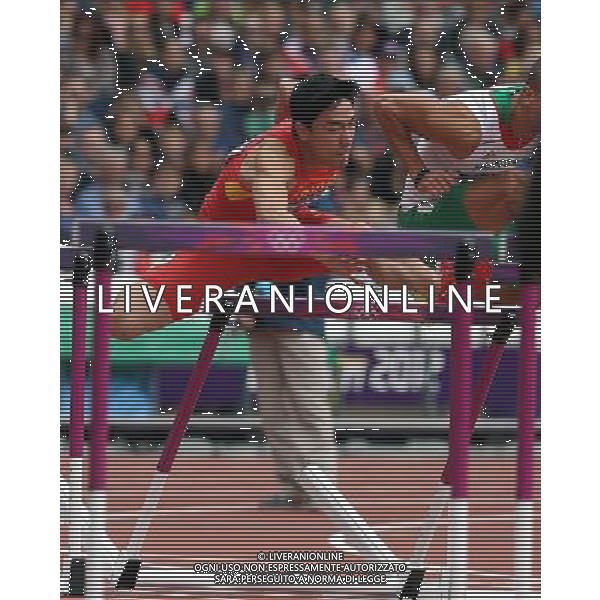 (120807) -- LONDON, Aug. 7, 2012 () -- China\'s Liu Xiang (L) fails to clear a hurdle during men\'s 110m hurdles heat at London 2012 Olympic Games, London, Britain, Aug. 7, 2012. Liu Xiang tumbled was disqualified for semifinal.(/Fan Jun)(zgp) AG ALDO LIVERANI S A S ONLY ITALY