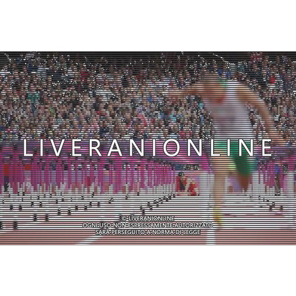 (120807) -- LONDON, Aug. 7, 2012 () -- China\'s Liu Xiang (L) sits on ground after falling during men\'s 110m hurdles heat at London 2012 Olympic Games, London, Britain, Aug. 7, 2012. Liu Xiang was disqualified for semifinal.(/Liao Yujie)(zgp) AG ALDO LIVERANI S A S ONLY ITALY