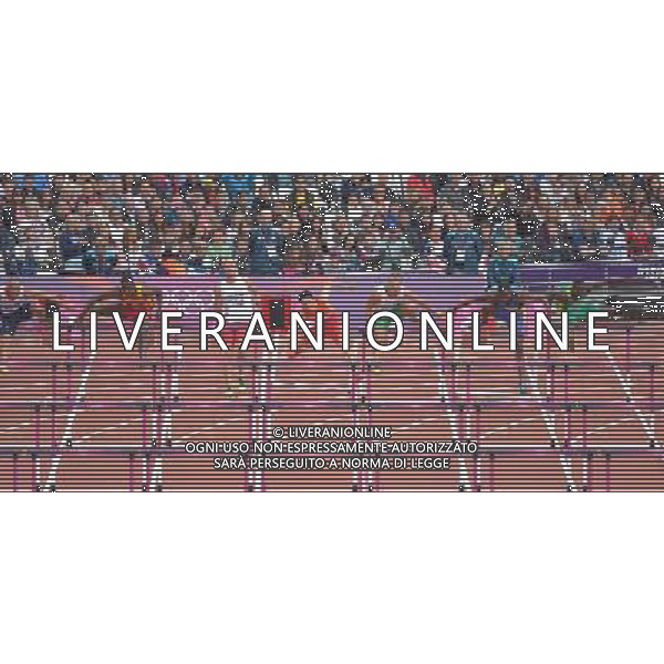 (120807) -- LONDON, Aug. 7, 2012 () -- China\'s Liu Xiang (C) falls during men\'s 110m hurdles heat at London 2012 Olympic Games, London, Britain, Aug. 7, 2012. Liu Xiang was disqualified for semifinal.(/Chen Xiaowei)(zgp) AG ALDO LIVERANI S A S ONLY ITALY