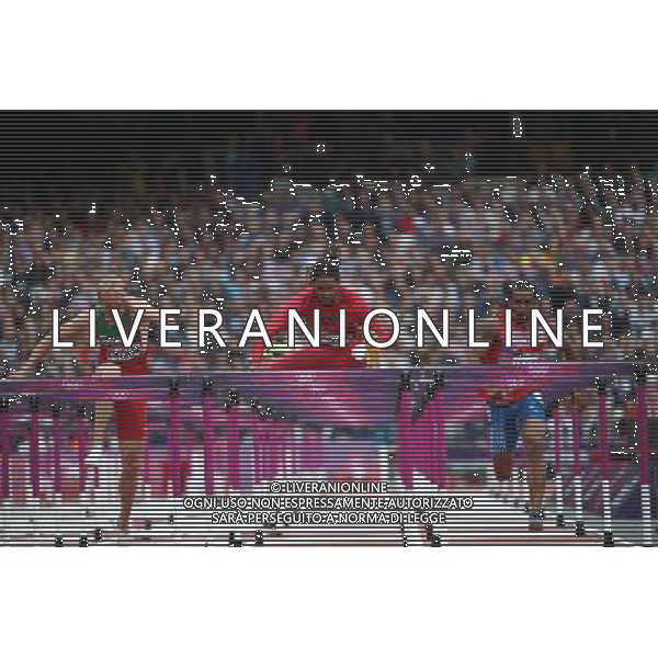 (120807) -- LONDON, Aug. 7, 2012 () -- Jason Richardson of the United States (C) competes during men\'s 110m hurdles heat at London 2012 Olympic Games, London, Britain, Aug. 7, 2012. Jason Richardson finished the heat with a time of 13.33 seconds and advanced to the semifinal. (/Liao Yujie) AG ALDO LIVERANI S A S ONLY ITALY
