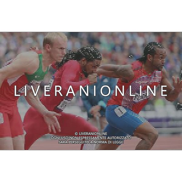 (120807) -- LONDON, Aug. 7, 2012 () -- Jason Richardson of the United States (C) competes during men\'s 110m hurdles heat at London 2012 Olympic Games, London, Britain, Aug. 7, 2012. Jason Richardson finished the heat with a time of 13.33 seconds and advanced to the semifinal. (/Li Ming) AG ALDO LIVERANI S A S ONLY ITALY