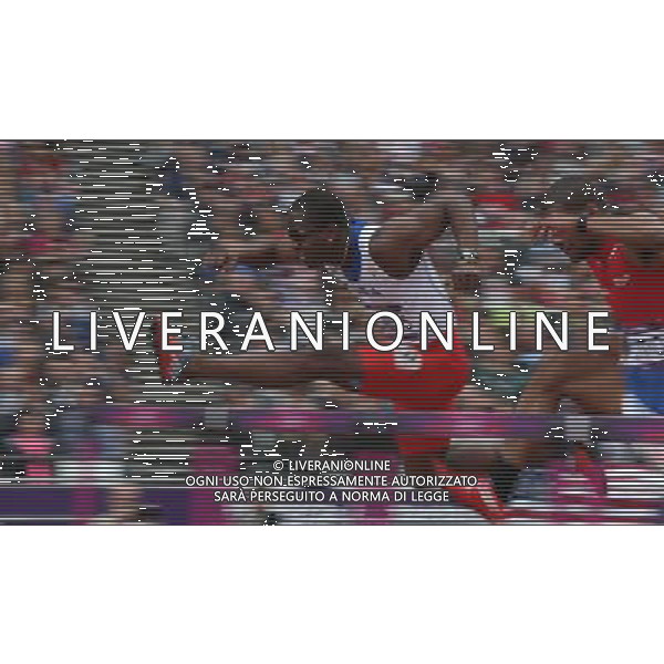(120807) -- LONDON, Aug. 7, 2012 () -- Dayron Robles of Cuba competes during men\'s 110m hurdles heat at London 2012 Olympic Games, London, Britain, Aug. 7, 2012. Robles finished the heat with a time of 13.33 seconds and advanced to the semifinal. (/Chen Xiaowei)(zgp) AG ALDO LIVERANI S A S ONLY ITALY