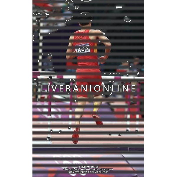 (120807) -- LONDON, Aug. 7, 2012 () -- China\'s Liu Xiang hops down the track after men\'s 110m hurdles heat at London 2012 Olympic Games, London, Britain, Aug. 7, 2012. Liu Xiang tumbled and was disqualified for semifinal.(/Fan Jun)(zgp) AG ALDO LIVERANI S A S ONLY ITALY