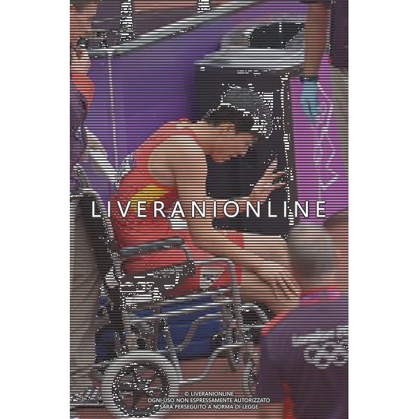 (120807) -- LONDON, Aug. 7, 2012 () -- China\'s Liu Xiang sits on a wheelchair after men\'s 110m hurdles heat at London 2012 Olympic Games, London, Britain, Aug. 7, 2012. Liu Xiang tumbled and was disqualified for semifinal.(/Chen Xiaowei)(zgp) AG ALDO LIVERANI S A S ONLY ITALY