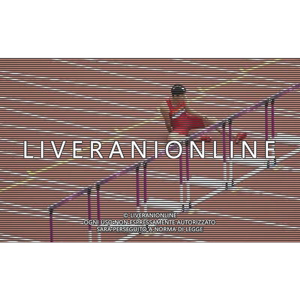 (120807) -- LONDON, Aug. 7, 2012 () -- China\'s Liu Xiang sits on ground after men\'s 110m hurdles heat at London 2012 Olympic Games, London, Britain, Aug. 7, 2012. Liu Xiang tumbled and was disqualified for semifinal.(/Fei Maohua)(zgp) AG ALDO LIVERANI S A S ONLY ITALY