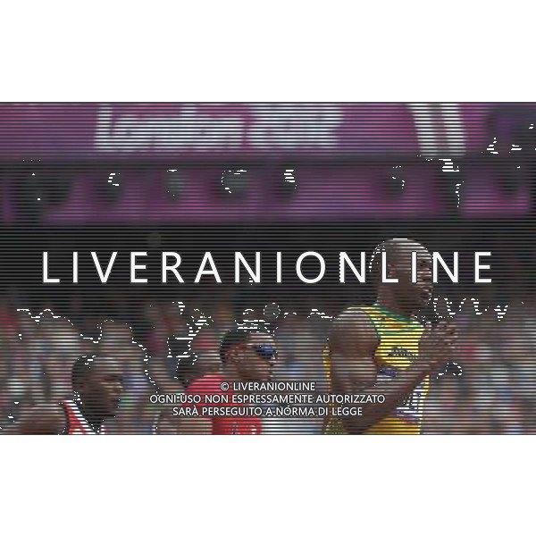 (120807) -- LONDON, Aug. 7, 2012 () -- Usain Bolt (R) of Jamaica competes during men\'s 200m heat at London 2012 Olympic Games, London, Britain, Aug. 7, 2012. Bolt advanced to semifinal with 20.39. (/Li Ming)(zgp) AG ALDO LIVERANI S A S ONLY ITALY