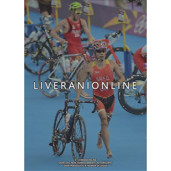 (120807) -- LONDON, Aug. 7, 2012 () -- Bai Faquan of China competes in men\'s triathlon competition at London 2012 Olympic Games in London, Britain, on August 7, 2012. Bai Faquan of China finished 46th. (/Zeng Yi) (nxl) AG ALDO LIVERANI S A S ONLY ITALY