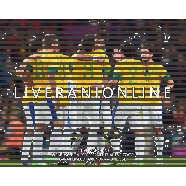 (120807) -- LONDON, Aug. 7, 2012 () -- Brazilian players celebrate during men\'s basketball semifinal match between Brazil and South Korea, at London 2012 Olympic Games in Manchester, Britain, on August 7, 2012. Brazil won 3-0. (/Liu Dawei) (nxl) AG ALDO LIVERANI S A S ONLY ITALY