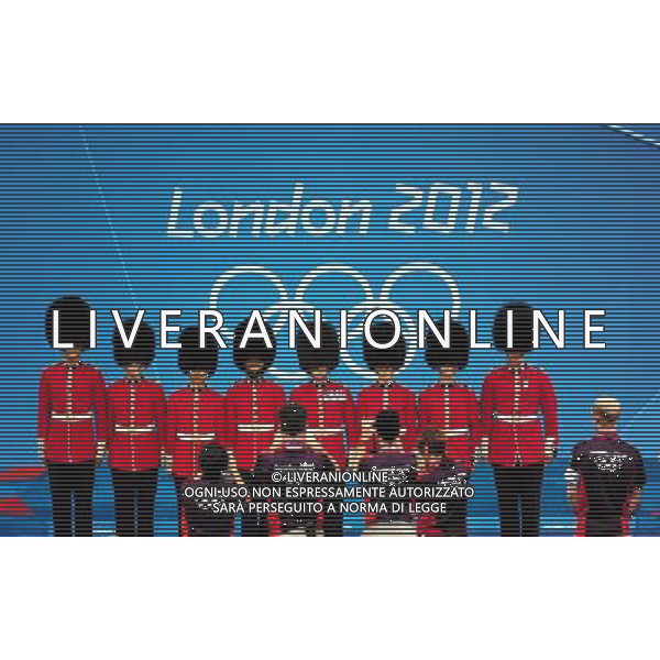 (120807) -- LONDON, Aug. 7, 2012 () -- Britain\'s 7th company coldstream guards are pictured after men\'s weightlifting +105kg contest, at London 2012 Olympic Games in London, Britain, on August 7, 2012. (/Tao Xiyi) (nxl) AG ALDO LIVERANI S A S ONLY ITALY