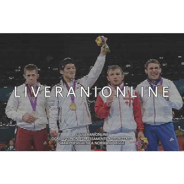 (120806) -- LONDON, Aug. 6, 2012 () -- Gold medalist Kim Hyeonwoo of South Korea (2nd L), silver medalist Tamas Lorincz of Hungary (1st L) and bronze medalists Manuchar Tskhadaia of Georgia (2nd R) and Steeve Guenot of France attend victory ceremony of men\'s wrestling greco-roman 66kg contest, at London 2012 Olympic Games in London, Britain, on August 6, 2012. (/Li Gang) (nxl) AG ALDO LIVERANI S A S ONLY ITALY