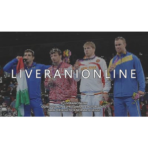 (120807) -- LONDON, Aug. 7, 2012 () -- Gold medalist Ghasem Gholamreza Rezaei of Iran (1st L), silver medalist Rustam Totrov of Russia (2nd L), bronze medalists Artur Aleksanyan of Armenia (3rd L) and Jimmy Lidberg of Sweden attend victory ceremony of men\'s wrestling Greco-Roman 96kg contest, at London 2012 Olympic Games in London, Britain, on August 7, 2012. (/Li Gang) (nxl) AG ALDO LIVERANI S A S ONLY ITALY