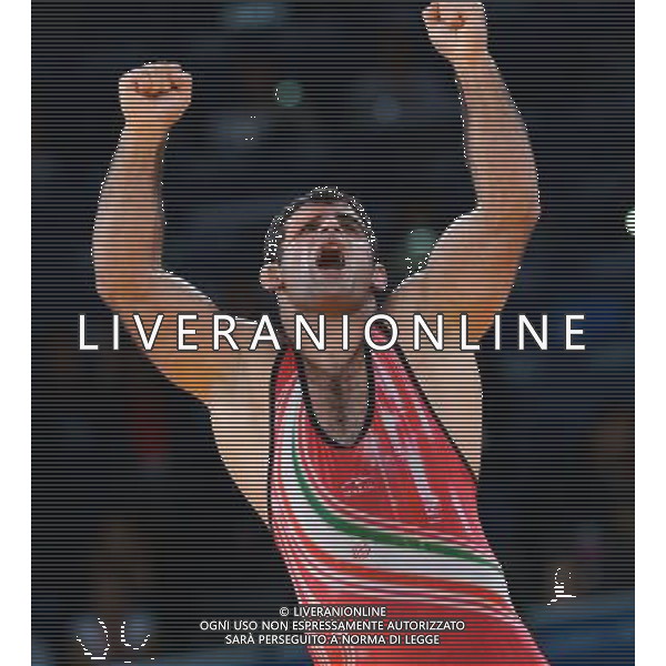 (120807) -- LONDON, Aug. 7, 2012 () -- Ghasem Gholamreza Rezaei of Iran celebrates after winning in men\'s wrestling Greco-Roman 96kg gold medal contest, at London 2012 Olympic Games in London, Britain, on August 7, 2012. (/Li Gang) (nxl) AG ALDO LIVERANI S A S ONLY ITALY