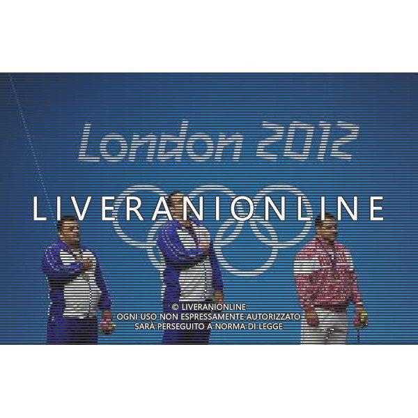 (120807) -- LONDON, Aug. 7, 2012 () -- Gold medalist Behdad Salimikordaiabi of Iran (C), silver medalist Sajjad Anoushiravani Hamlabad of Iran (L) and bronze medalist Ruslan Albegov of Russian attend victory ceremony of men\'s weightlifting +105kg contest, at London 2012 Olympic Games in London, Britain, on August 7, 2012. (/Tao Xiyi) (nxl) AG ALDO LIVERANI S A S ONLY ITALY
