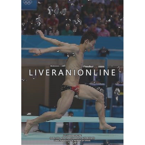 (120807) -- LONDON, Aug. 7, 2012 () -- Qin Kai of China competes during men\'s diving 3m springboard final contest, at London 2012 Olympic Games in London, Britain, on August 7, 2012. Qin Kai of China won silver medal. (/Fan Jun) (nxl) AG ALDO LIVERANI S A S ONLY ITALY