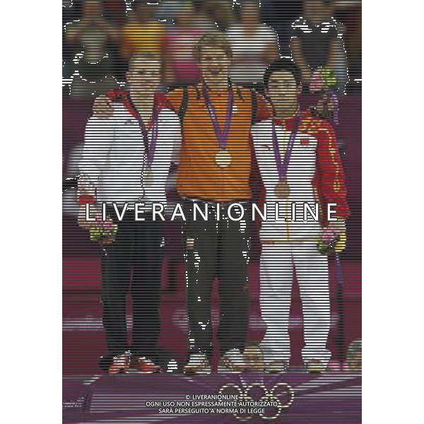 (120807) -- LONDON, Aug. 7, 2012 () -- Gold medalist Epke Zonderland (C) of Netherlands, silver medalist Fabian Hambuchen (L) of Germany, and bronze medalist Zou Kai of China pose at awarding ceremony of men\'s horizontal bar of gymnastics artistic, at London 2012 Olympic Games in London, Britain, on August 7, 2012. Epke Zonderland won gold medal in this event. (/Shen Bohan) (zgp) AG ALDO LIVERANI S A S ONLY ITALY