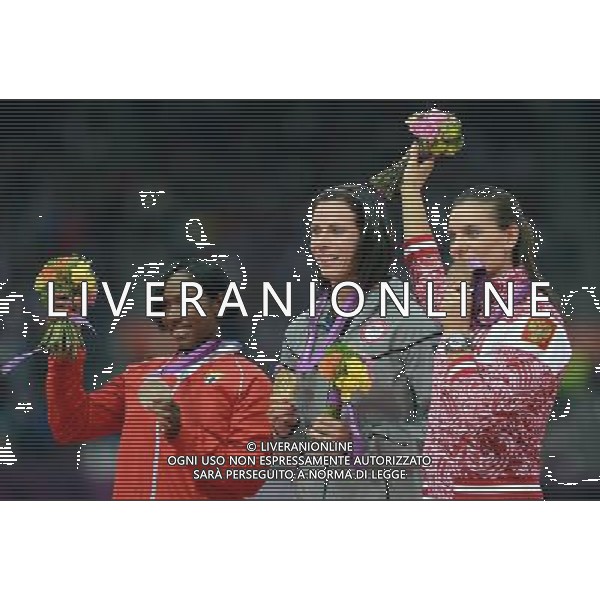 (120807) -- LONDON, Aug. 7, 2012 () -- Gold medalist Jennifer Suhr of USA (C), silver medalist Yarisley Silva of Cuba (L) and bronze medalist Elena Isinbaeva of Russia attend victory ceremony of women\'s pole vault competition, at London 2012 Olympic Games in London, Britain, on August 7, 2012. (/Yang Zongyou) (nxl) AG ALDO LIVERANI S A S ONLY ITALY