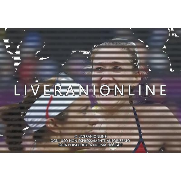 (120807) -- LONDON, Aug. 7, 2012 () -- Misty May-Treanor and Kirri Walsh Jennings of the United States celebrate after winning the women\'s beach volleyball semifinal match against China\'s Xue Chen and Zhang Xi at London 2012 Olympic Games, London, Britain, Aug. 7, 2012. (/Wang Shen) AG ALDO LIVERANI S A S ONLY ITALY