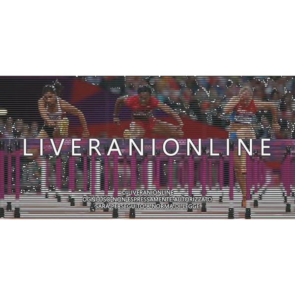 (120807) -- LONDON, Aug. 7, 2012 () -- Kellie Wells of USA (C) competes in women\'s 100m hurdles semifinal 3 competition, at London 2012 Olympic Games in London, Britain, on August 7, 2012. (/Liao Yujie) (nxl) AG ALDO LIVERANI S A S ONLY ITALY