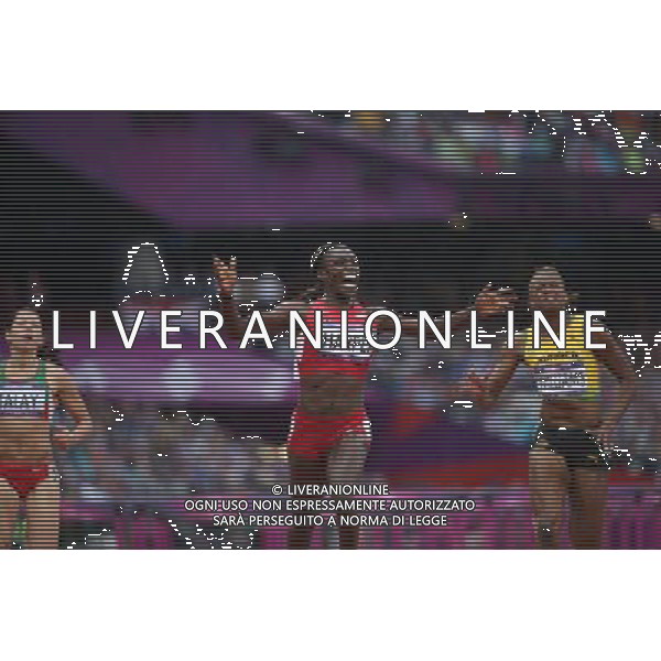 (120807) -- LONDON, Aug. 7, 2012 () -- Dawn Harper of USA (C) celebrates after winning in women\'s 100m hurdles semifinal 1 competition, at London 2012 Olympic Games in London, Britain, on August 7, 2012. (/Liao Yujie) (nxl) AG ALDO LIVERANI S A S ONLY ITALY