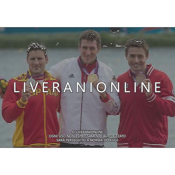 (120807) -- LONDON, Aug. 7, 2012 () -- Gold medalist Sebastian Brendel of Germany (C), silver medalist David Cal Figueroa of Spain (L) and bronze medalist Mark Oldershaw of Canada attend victory ceremony of men\'s 1000m Canoe Single (C1) competition of Canoe Sprint event, at London 2012 Olympic Games in Britain, on August 7, 2012. (/Cheng Min) (nxl) AG ALDO LIVERANI S A S ONLY ITALY