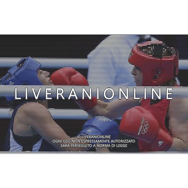 (120808) -- LONDON, Aug. 8, 2012 () -- Katie Taylor of Ireland (in red) competes with Mavzuna Chorieva of Tajikstan during women\'s boxing light (57-60kg) semifinal match, at London 2012 Olympic Games in London, Britain, on August 8, 2012. Katie Taylor of Ireland won. (/Wang Shen) (nxl) /PHOTOSHOT/AG ALDO LIVERANI SAS ITALY ONLY -