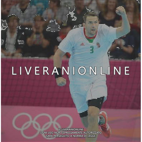 (120808) -- LONDON, Aug. 8, 2012 () -- Ferenc Ilyes of Hungary celebrates scoring during the quarterfinal match of men\'s handball against Iceland at London 2012 Olympic Games, London, Britain, Aug. 8, 2012. Hungary won the match 34-33 and advanced to the next round. (/Guo Yong) /PHOTOSHOT/AG ALDO LIVERANI SAS ITALY ONLY -