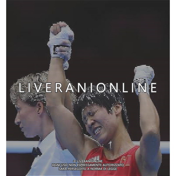 (120808) -- LONDON, Aug. 8, 2012 () -- Ren Cancan of China (in red) reacts after defeating Marien Esparza of USA in women\'s boxing Fly (48-51kg) semifinal match, at London 2012 Olympic Games in London, Britain, on August 8, 2012. (/Wang Shen) (nxl) /PHOTOSHOT/AG ALDO LIVERANI SAS ITALY ONLY -