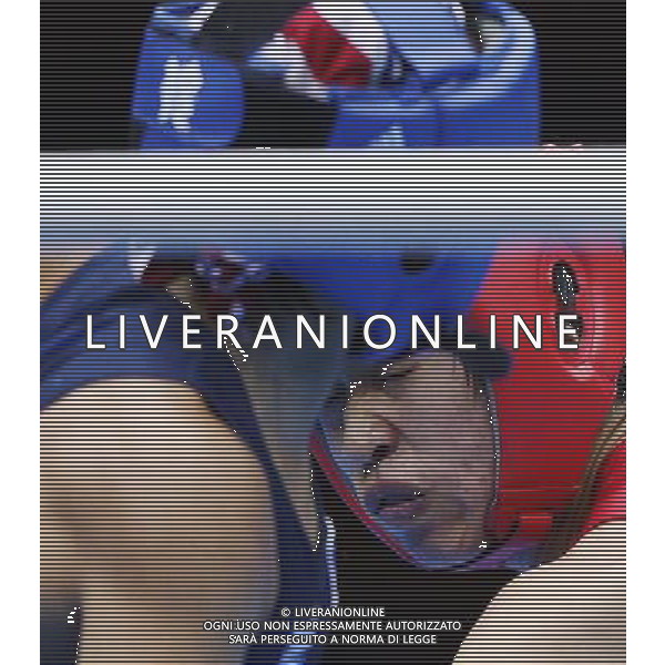 (120808) -- LONDON, Aug. 8, 2012 () -- Ren Cancan of China (in red) fights with Marien Esparza of USA during women\'s boxing Fly (48-51kg) semifinal match, at London 2012 Olympic Games in London, Britain, on August 8, 2012. Ren Cancan of China won. (/Wang Shen) (nxl) /PHOTOSHOT/AG ALDO LIVERANI SAS ITALY ONLY -