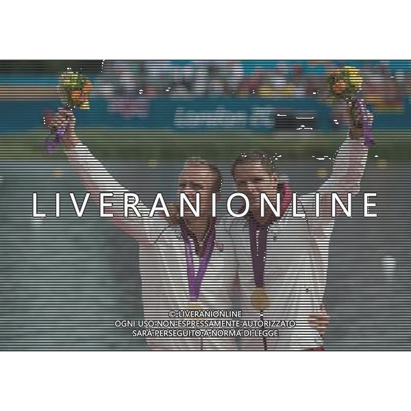 (120807) -- LONDON, Aug. 7, 2012 () -- Gold medaslits Rudolf Dombi and Roland Kokeny of Hungary attends victory ceremony of men\'s 1000m kayak double (K2) competition of Canoe Sprint event, at London 2012 Olympic Games in Britain, on August 7, 2012. (/Cheng Min) (nxl) /PHOTOSHOT/AG ALDO LIVERANI SAS ITALY ONLY -