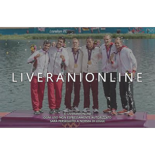 (120807) -- LONDON, Aug. 7, 2012 () -- Gold medaslits Rudolf Dombi and Roland Kokeny of Hungary (C), silver medalists Fernando Pimenta and Emanuel Silva of Portugal (L) and bronze medalists Martin Hollstein and Andreas Ihle of Germany attend victory ceremony of men\'s 1000m kayak double (K2) competition of Canoe Sprint event, at London 2012 Olympic Games in Britain, on August 7, 2012. (/Cheng Min) (nxl) /PHOTOSHOT/AG ALDO LIVERANI SAS ITALY ONLY -