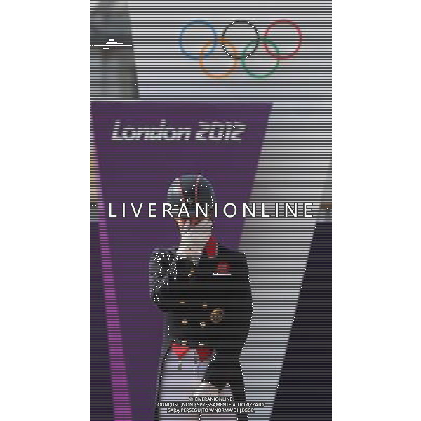 (120809) -- LONDON, Aug. 9, 2012 () -- Gold medalist Charlotte Dujardin of Britain reacts during victory ceremony of Dressage Individual competition of Equestrian event, at London 2012 Olympic Games in London, Britain, on August 9, 2012. (/Jin Liwang) (nxl) ©photoshot/AGENZIA ALDO LIVERANI SAS - ITALY ONLY - GIOCHI OLIMPICI, OLIMPIADI LONDRA 2012
