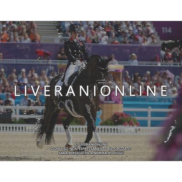 (120809) -- LONDON, Aug. 9, 2012 () -- Charlotte Dujardin of Britain takes part in Dressage Individual Grand Prix Freestyle competition of Equestrian event, at London 2012 Olympic Games in London, Britain, on August 9, 2012. Charlotte Dujardin of Britain won gold medal. (/Jin Liwang) (nxl) ©photoshot/AGENZIA ALDO LIVERANI SAS - ITALY ONLY - GIOCHI OLIMPICI, OLIMPIADI LONDRA 2012