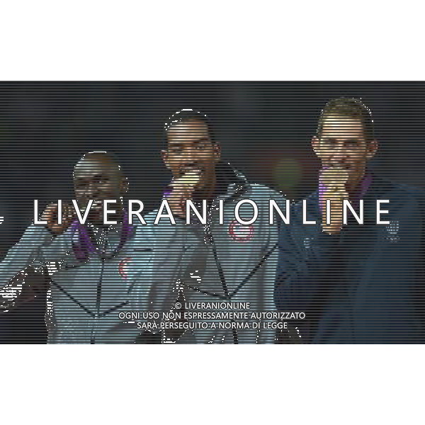 (120809) -- LONDON, Aug. 9, 2012 () -- Gold medalist Christian Taylor (C) of USA, silver medalist Will Claye (L) of USA, and bronze medalist Leonel Suarez of Cuba pose at awarding ceremony of men\'s triple jump, at London 2012 Olympic Games, London, Britain, Aug. 9, 2012. (/Yang Zongyou)(zgp) ©photoshot/AGENZIA ALDO LIVERANI SAS - ITALY ONLY - GIOCHI OLIMPICI, OLIMPIADI LONDRA 2012