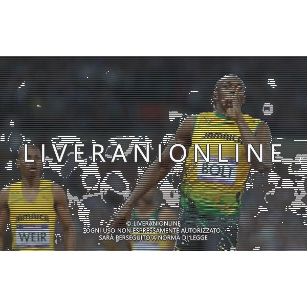 (120809) -- LONDON, Aug. 9, 2012 () -- Usain Bolt (R) of Jamaica celebrates after men\'s 200m final, at London 2012 Olympic Games, London, Britain, Aug. 9, 2012. Usain Bolt won gold medal with 19.32. (/Li Ga)(zgp) ©photoshot/AGENZIA ALDO LIVERANI SAS - ITALY ONLY - GIOCHI OLIMPICI, OLIMPIADI LONDRA 2012