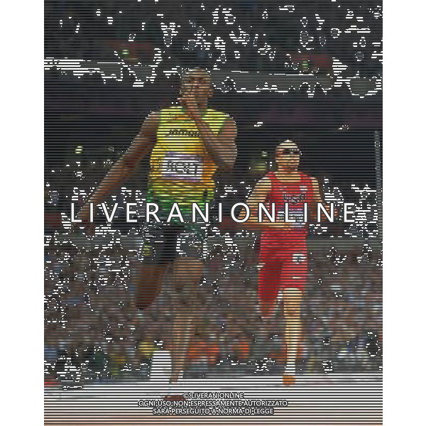 (120809) -- LONDON, Aug. 9, 2012 () -- Usain Bolt of Jamaica celebrates after men\'s 200m final, at London 2012 Olympic Games, London, Britain, Aug. 9, 2012. Usain Bolt won gold medal with 19.32. (/Li Ga)(zgp) ©photoshot/AGENZIA ALDO LIVERANI SAS - ITALY ONLY - GIOCHI OLIMPICI, OLIMPIADI LONDRA 2012
