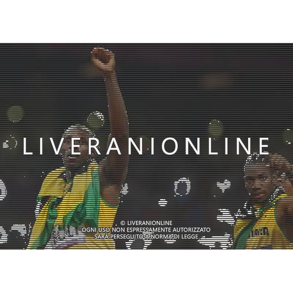 (120809) -- LONDON, Aug. 9, 2012 () -- Usain Bolt (L) of Jamaica celebrates with teammate Yohan Blake after men\'s 200m final, at London 2012 Olympic Games, London, Britain, Aug. 9, 2012. Jamaican athletes Usain Bolt, Yohan Blake and Warren Weir won gold, silver and bronze medals in this event. (/Li Ga)(zgp) ©photoshot/AGENZIA ALDO LIVERANI SAS - ITALY ONLY - GIOCHI OLIMPICI, OLIMPIADI LONDRA 2012