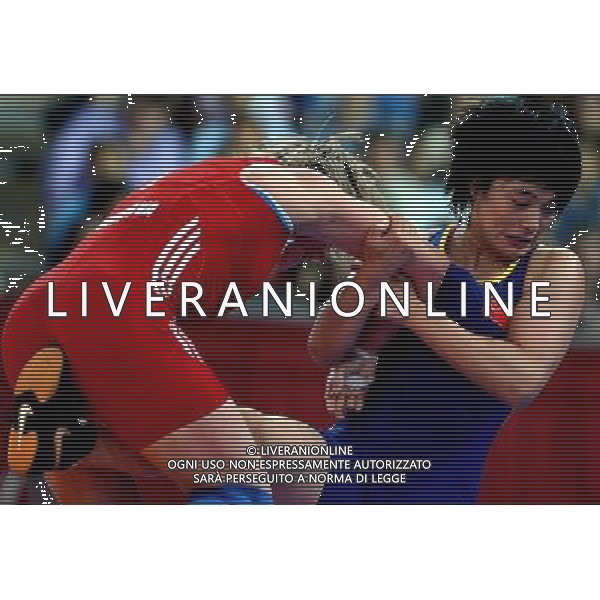 (120809) -- LONDON, Aug. 9, 2012 () -- Wang Jiao of China (blue) competes with Guzel Manyurova of Kazakhstan during the bronze medal match of women\'s wrestling freestyle 72kg at London 2012 Olympic Games in London, Britain, on August 9, 2012. Guzel Manyurova of Kazakhstan won the match and claimed the bronze medal. (/Gesang Dawa) ©photoshot/AGENZIA ALDO LIVERANI SAS - ITALY ONLY - GIOCHI OLIMPICI, OLIMPIADI LONDRA 2012