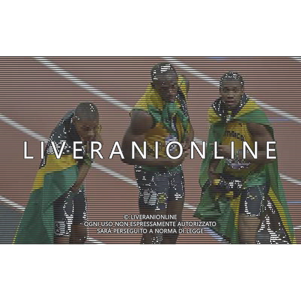 Warren Weir (L), Yohan Blake (L) and Usain Bolt (C) and Yohan Blake (R). Olympic Stadium, Olympic Park, Stratford. London ©PHOTOSHOT/AGENZIA ALDO LIVERANI SAS - ITALY ONLY - GIOCHI OLIMPICI, OLIMPIADI LONDRA 2012