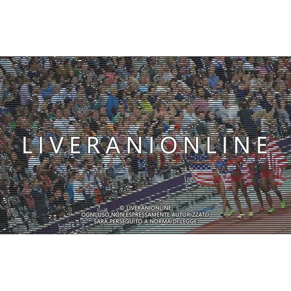 (120810) -- LONDON, Aug. 10, 2012 () -- U.S. runners celebrate after women\'s 4x100m relay final at London 2012 Olympic Games, London, Britain, Aug. 10, 2012. The U.S. team won gold medal in this event with a new world record of 40.82. (/Gong Lei)(zgp) ©photoshot/Agenzia Aldo Liverani Sas - ITALY ONLY - GIOCHI OLIMPICI, OLIMPIADI LONDRA 2012