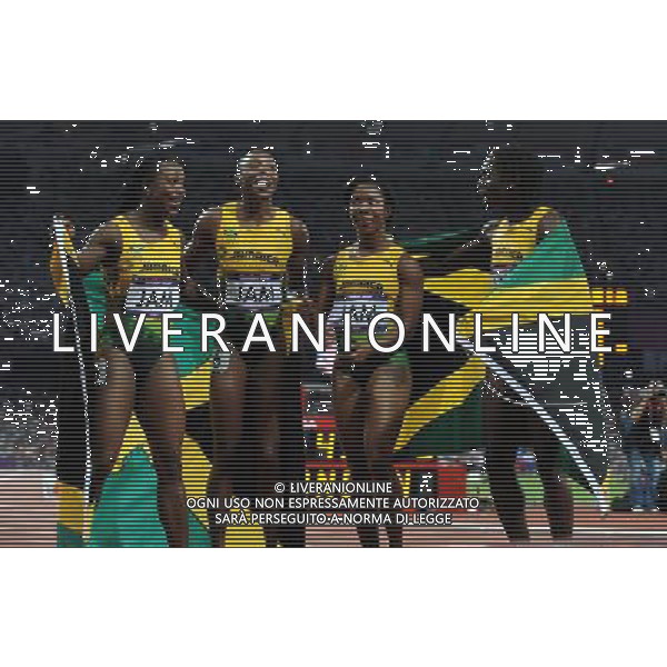 (120810) -- LONDON, Aug. 10, 2012 () -- Runners of Jamaica celebrate after women\'s 4x100m relay final at London 2012 Olympic Games, London, Britain, Aug. 10, 2012. The Jamaican team won silver medal with 41.41. (/Li Gang)(zgp) AG ALDO LIVERANI S A S ONLY ITALY