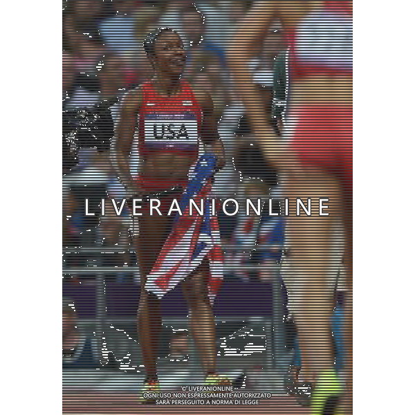 (120810) -- LONDON, Aug. 10, 2012 () -- Carmelita Jeter of U.S. celebrate after women\'s 4x100m relay final at London 2012 Olympic Games, London, Britain, Aug. 10, 2012. The U.S. team won gold medal in this event with a new world record of 40.82. (/Li Gang)(zgp) AG ALDO LIVERANI S A S ONLY ITALY