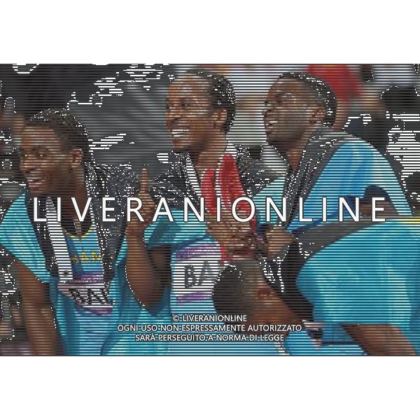 (120810) -- LONDON, Aug. 10, 2012 () -- Runners of Bahamas celebrate after men\'s 4x400m relay final at London 2012 Olympic Games, London, Britain, Aug. 10, 2012. The Bahamian team won gold medal with 2:56.72. (/Liao Yujie)(zgp) AG ALDO LIVERANI S A S ONLY ITALY