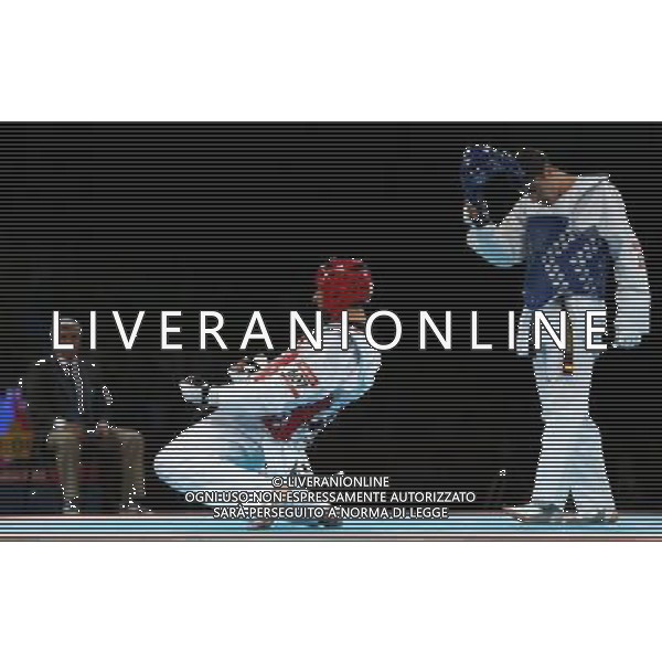 (120810) -- LONDON, Aug. 10, 2012 () -- Sebastian Eduardo Crismanich of Argentina (red) celebrates after winning over Nicolas Garcia Hemme of Spain during the gold medal match of men\'s Taekwondo -80kg event at London 2012 Olympic Games in London, Britain, on August 10, 2012. Sebastian Eduardo Crismanich of Argentina won the match and claimed the gold medal of the event. (/Wang Lili) AG ALDO LIVERANI S A S ONLY ITALY